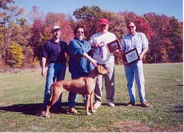 Abby with breeder and jusges